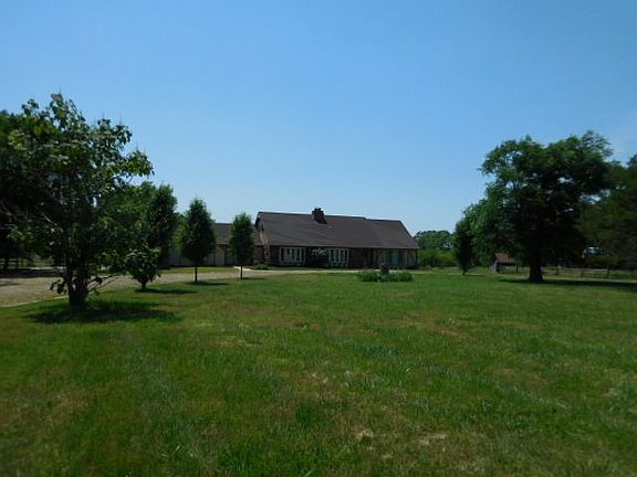 10 acres on paved road