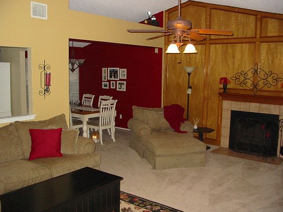 Living Room with fireplace and vaulted ceiling
