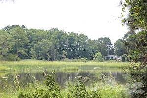 VIEW OF HOME FROM CREEK