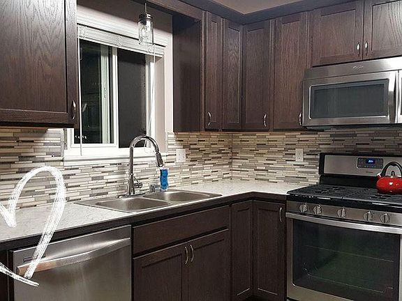 Backsplash - recently added in kitchen and both bathrooms!