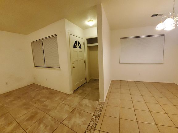 Entry way leads to Living Room and Dining Room