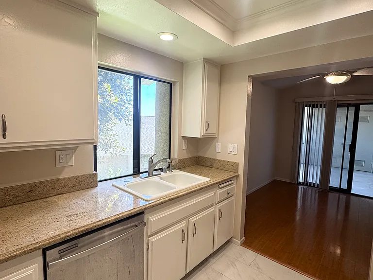 Kitchen opens to dining room