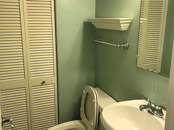 First floor half bath with linen closet