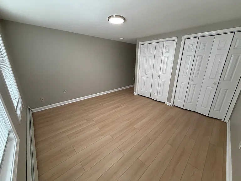Master bed w/ 2 closets - can fit a king bed and dresser
