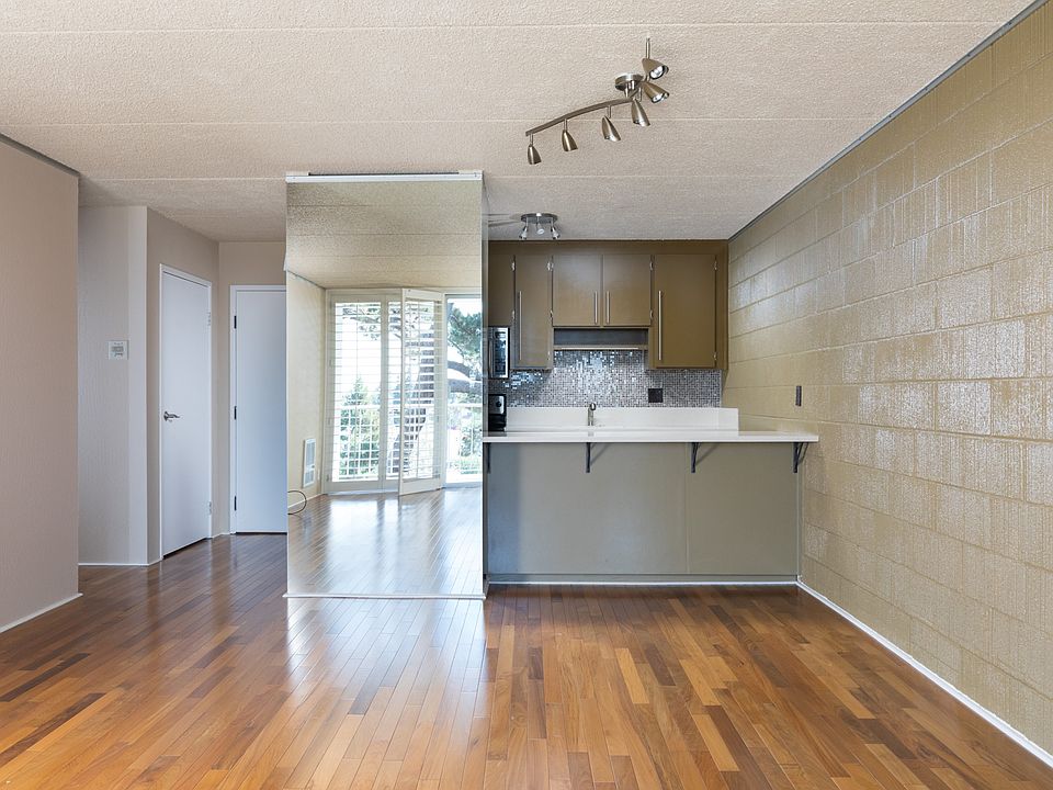 East facing shot of dining area and kitchen