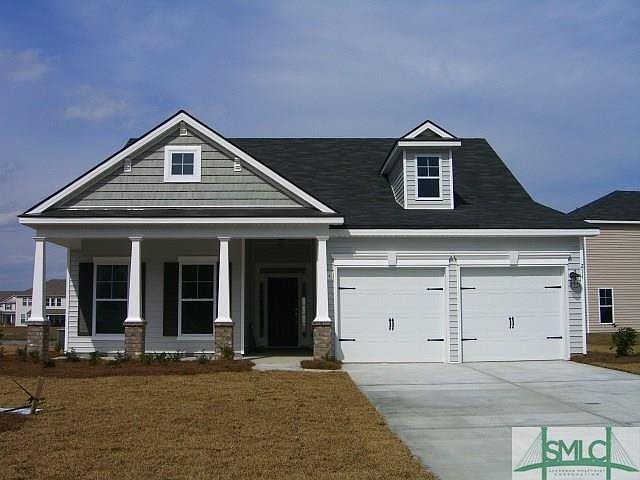 NEW CONSTRUCTION:  EXTERIOR FRONT WITH LARGE FRONT PORCH.  FULLY SODDED YARD WITH IRRIGATION