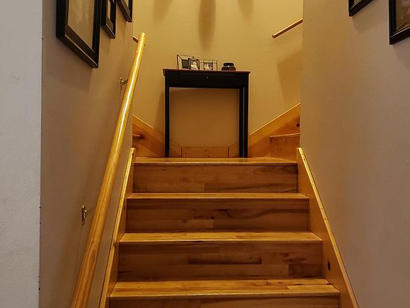 Stairway to bedrooms and bathrooms
