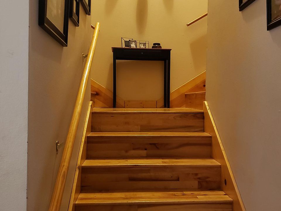 Stairway to bedrooms and bathrooms