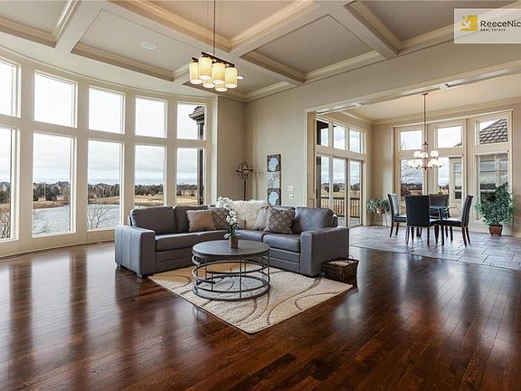 Spacious Great Room with unobstructed views of the Nicklaus Golf Course, #2, #3 and pond. Room to relax, enjoy life.