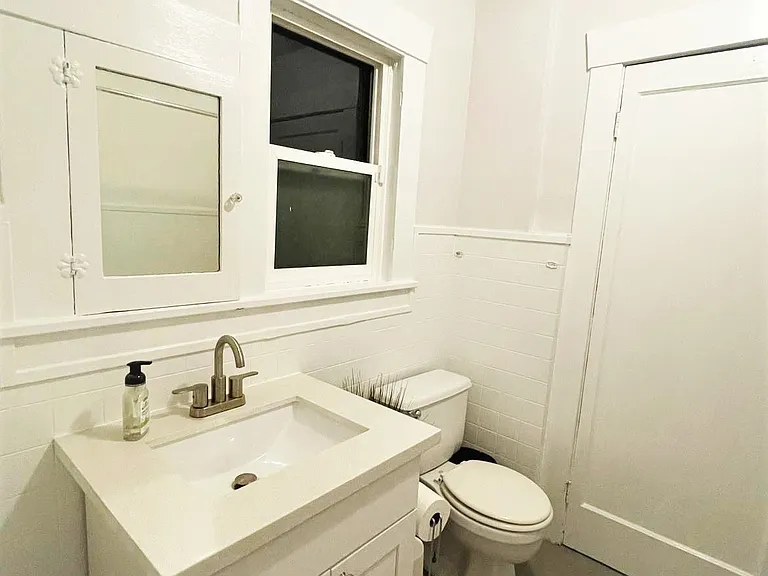 Bathroom #1 (jack & jill) between bedroom #1 and #2.