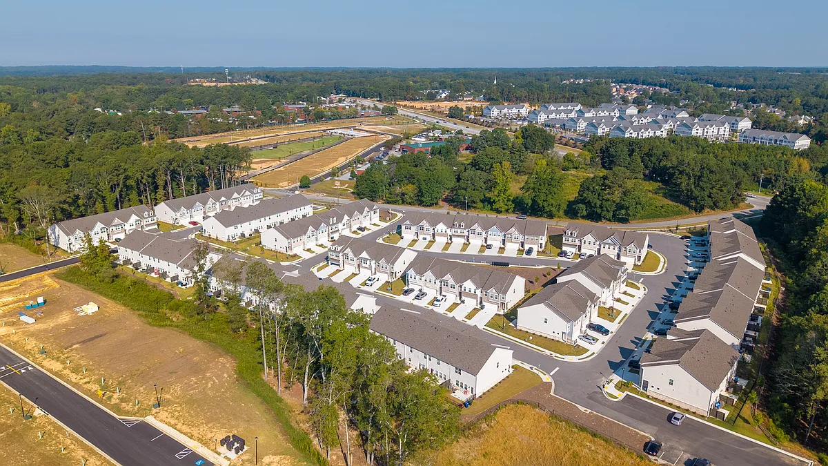 Bird's-eye view showcasing the full layout of the community. - Carlton Crossing
