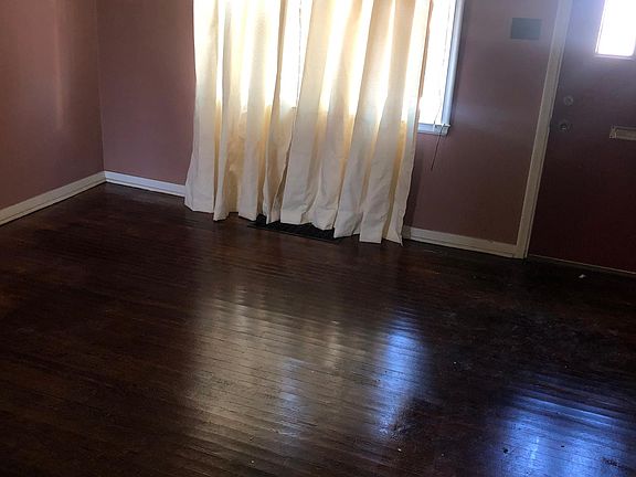 living room area with hardwood floor