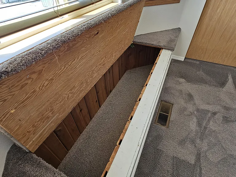 Hidden storage compartment in bedroom 1