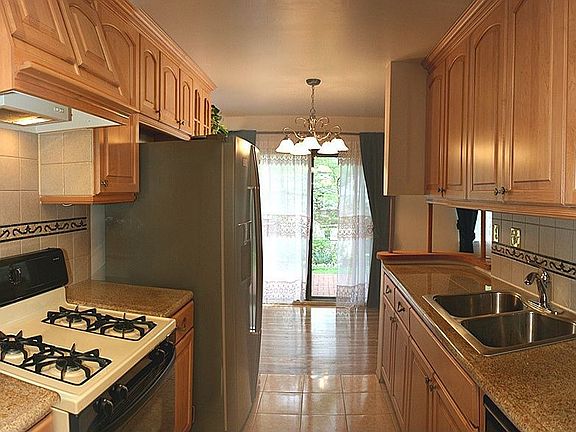 Updated Kitchen - Granite, Tile, Cabinets, Stainless Fridge