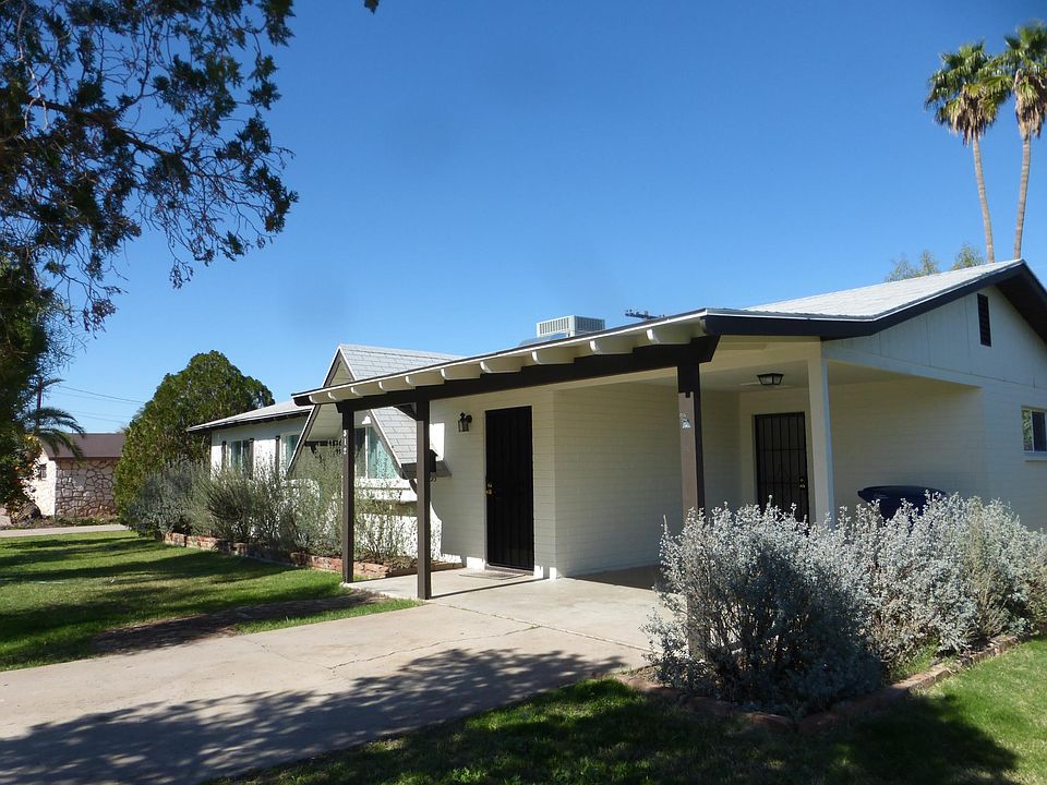 Front of home from east of carport.