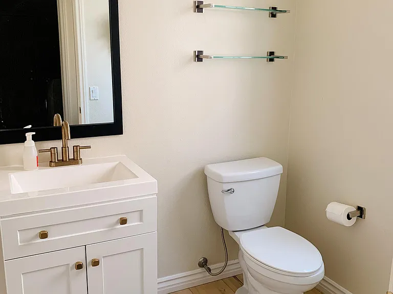 Powder bathroom located on main floor just off the family room.
