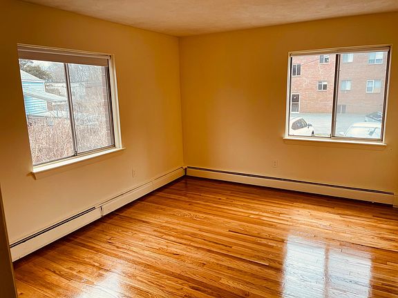 Large, sunny bedroom.