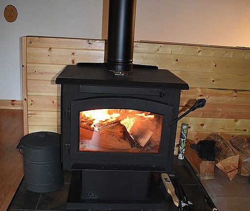 Heat by wood and propane