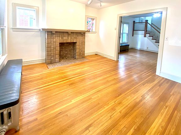 Living Room with decorative fire place and mantle