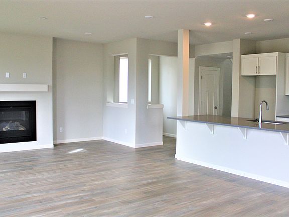 Kitchen/dining room and front room. includes an office nook.