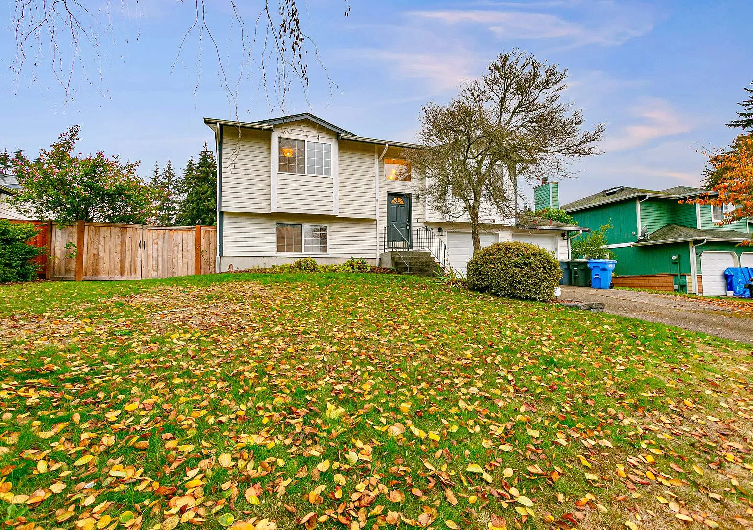 Updated 4-Bedroom Home with Deck & Two-Car Garage — Photo 4