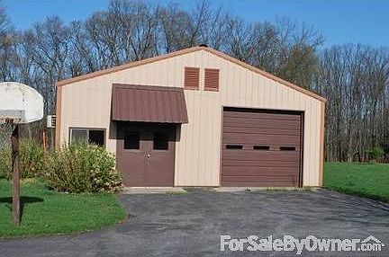 Detached Storage and Shop
						:
						30 x 66 ft with two overhead doors and a double door to the shop.