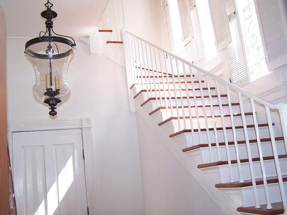 Bike etc. storage hall and stairs to upstairs unit