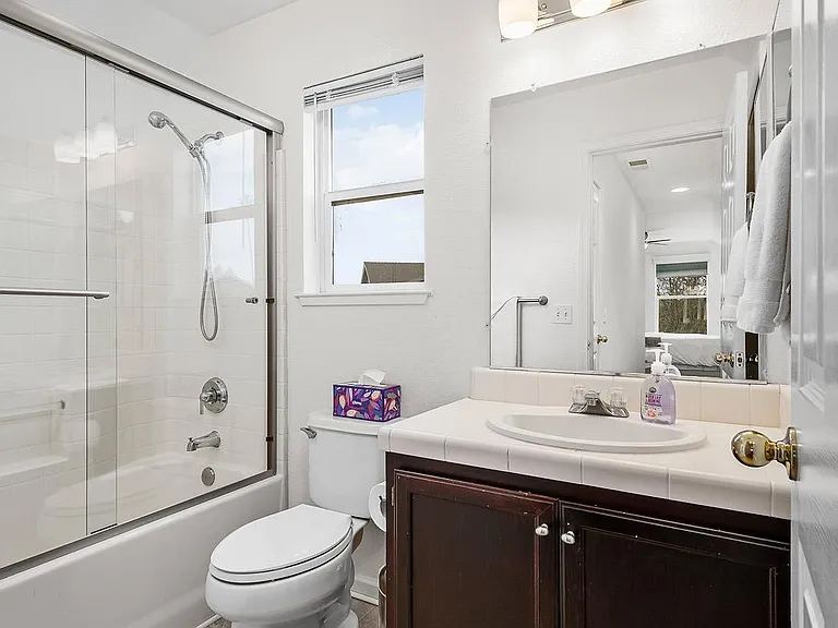 Primary bathoom. Also features huge linen closet.