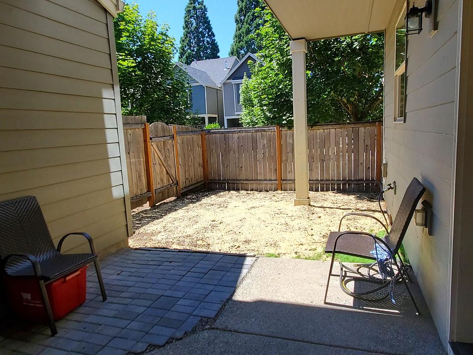 Backyard patio and grass area (grass has been planted)