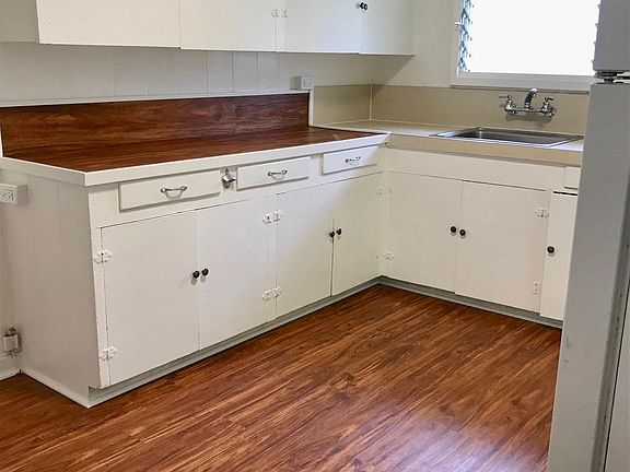 Kitchen large enough to put a table & chairs. Also Two windows and a door to let air in.