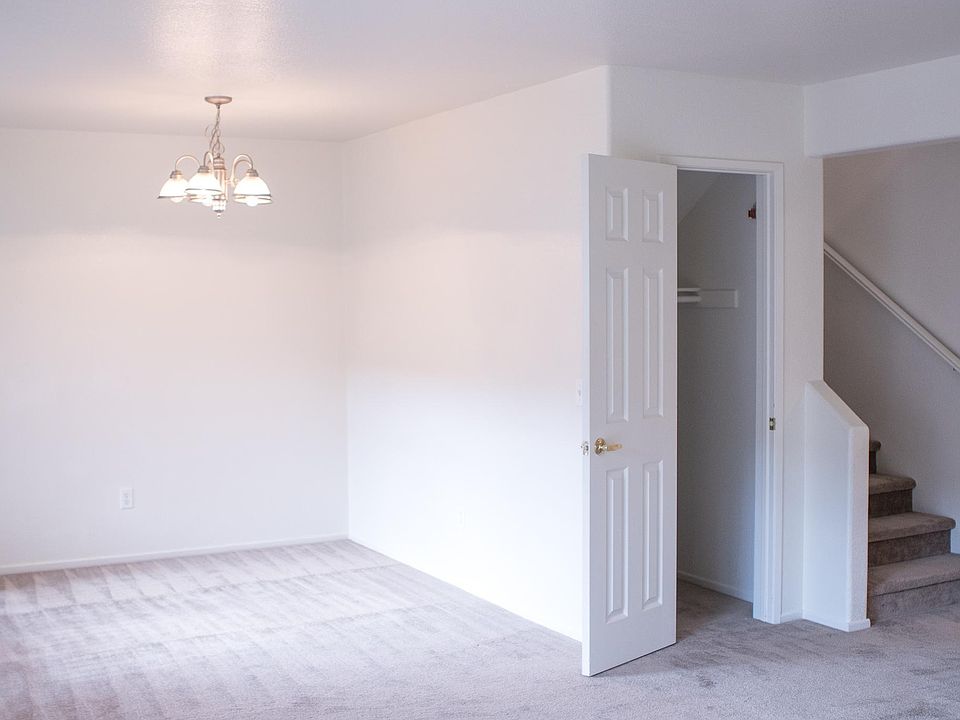 Dining room, storage closet, stairs (living room view)