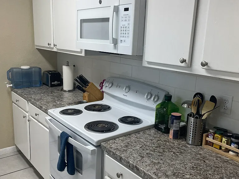 Enjoy cooking with new electric stove and microwave.