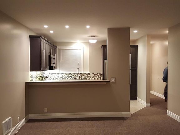 View of kitchen bar seating from living room