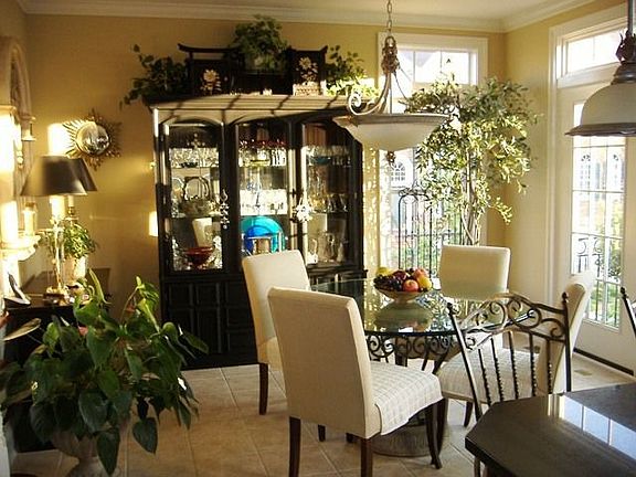 Beautiful Breakfast Room overlooks the deck w/views of golf course