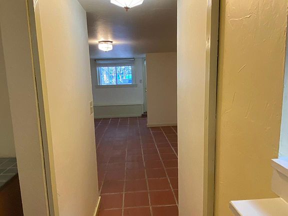 Hallway to Kitchen and Bathroom