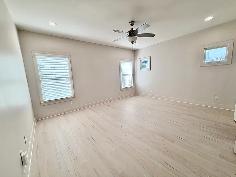 The primary bedroom has two very large closets