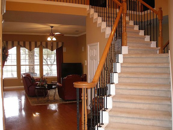 Grand Staircase With Iron Spindles