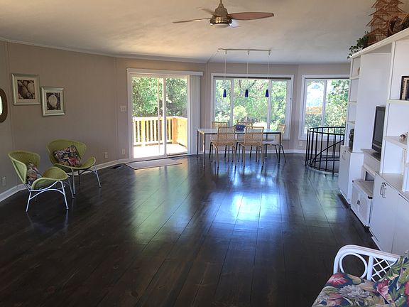 Living area facing dining