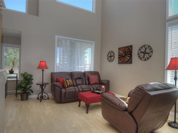 Large living room with bright sunlight