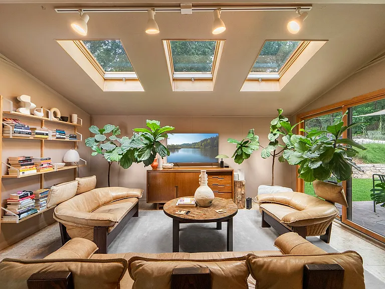 So inviting with skylights & sliding door to backyard.