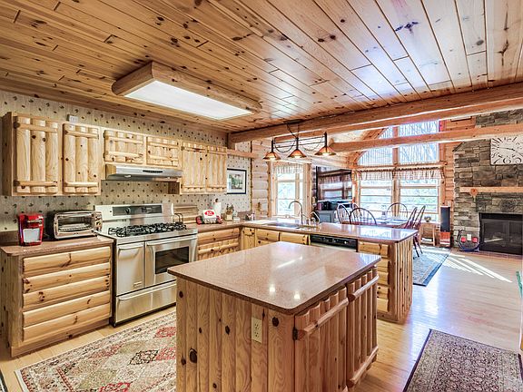 You'll love the open concept in the kitchen - Quartz countertops are featured along with high-end stainless appliances 