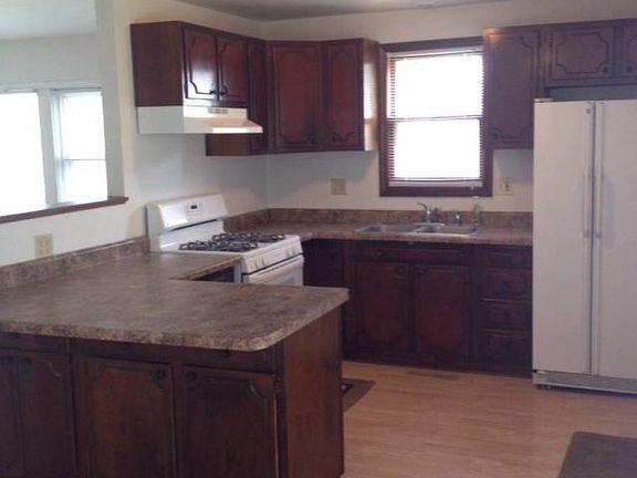 Kitchen has self-clean gas stove/oven, range hood, refrigerator and a snack counter where you can sit with your morning coffee and enjoy the view.