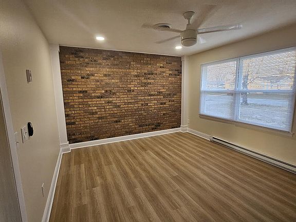 Can lights installed to show brick accent wall.