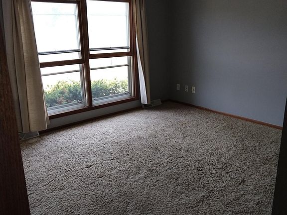 Living room from kitchen hallway.