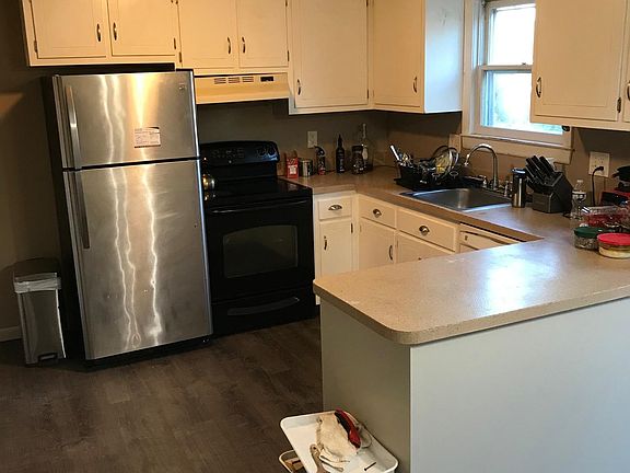 Eat in kitchen with updated apliances and pantry closet! Brand new floors throughout!!!