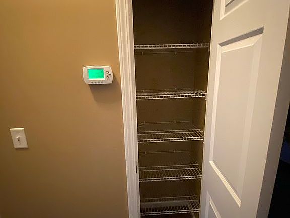 Guest bathroom linen closet