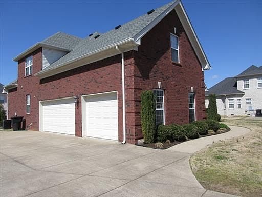3 Car Garage w/ Workshop