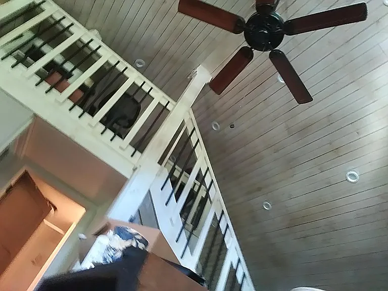 Wacky photo but stairs up to loft over bedrooms