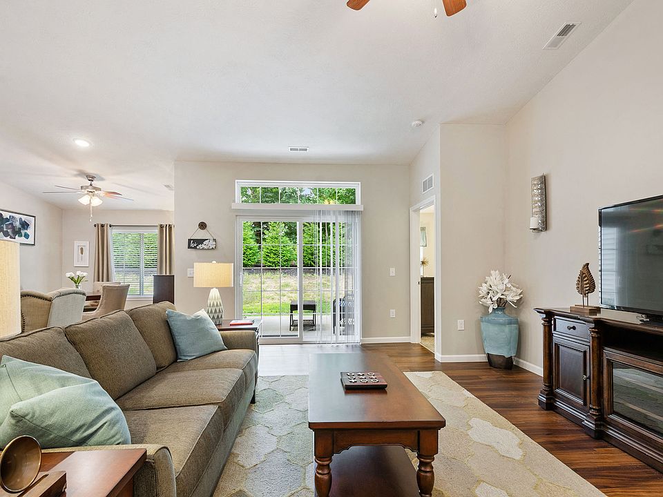 Relax in Your Spacious Living Room or Head Out Onto Your Personal Patio