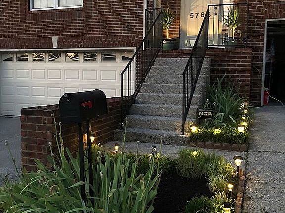 Front of townhouse at night